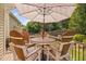 Outdoor deck featuring a dining table and chairs, creating an inviting space for gatherings at 3806 Stoneybrook Dr, Durham, NC 27705