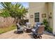 Private backyard patio featuring cozy seating, ideal for enjoying tranquil moments outdoors at 3806 Stoneybrook Dr, Durham, NC 27705
