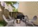 An outdoor patio featuring a fire pit, grill and patio furniture at 3806 Stoneybrook Dr, Durham, NC 27705