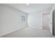 Neutral bedroom with carpet, light walls, and an en suite bathroom doorway at 3813 Rosebush Dr, Zebulon, NC 27597