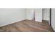 Bedroom with wood flooring, neutral paint, and an attached bathroom at 3813 Rosebush Dr, Zebulon, NC 27597