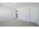 Bright and airy bedroom featuring plush carpet and white trim at 3813 Rosebush Dr, Zebulon, NC 27597