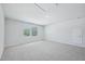 Bright bonus room with plush carpeting, natural light, and extra storage at 3813 Rosebush Dr, Zebulon, NC 27597
