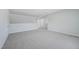 Bright hallway features neutral walls and plush carpet at 3813 Rosebush Dr, Zebulon, NC 27597