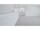 Hallway with neutral walls and plush carpet at 3813 Rosebush Dr, Zebulon, NC 27597