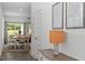 Inviting entryway with a console table, decorative lamp, and hardwood floors at 479 Clark Creek Ln, Cary, NC 27519