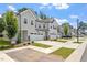 Modern townhomes line a well-maintained street in a desirable neighborhood at 479 Clark Creek Ln, Cary, NC 27519