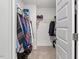 Organized walk-in closet with ample storage space at 479 Clark Creek Ln, Cary, NC 27519