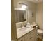 Clean bathroom with a modern vanity, elegant lighting and a neutral color scheme at 500 Umstead Dr # D307, Chapel Hill, NC 27516