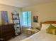 Inviting bedroom with a large window, neutral walls, and stylish decor at 500 Umstead Dr # D307, Chapel Hill, NC 27516