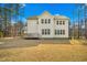 Expansive backyard featuring a well-manicured lawn, surrounded by beautiful trees at 5148 Glen Creek Trl, Garner, NC 27529