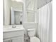 Clean bathroom with a vanity, toilet, and shower with a curtain at 5148 Glen Creek Trl, Garner, NC 27529
