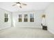 Spacious bedroom with a ceiling fan and windows providing ample natural light at 5148 Glen Creek Trl, Garner, NC 27529