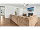 Comfortable living room with fireplace, TV, and plush sectional couch at 5148 Glen Creek Trl, Garner, NC 27529