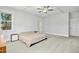 Large bedroom with carpet and natural lighting at 5148 Glen Creek Trl, Garner, NC 27529