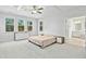 Spacious main bedroom with coffered ceilings and ensuite bathroom access at 5148 Glen Creek Trl, Garner, NC 27529