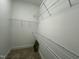 Walk-in closet with carpeted floor and multiple wire shelves at 526 Cardena School Rd, Fuquay Varina, NC 27526
