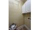 Laundry room featuring built-in storage shelves and complementing neutral colored walls at 526 Cardena School Rd, Fuquay Varina, NC 27526