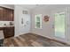 Kitchen area featuring storage cabinets and a glass door leading to outdoor space, enhancing natural light at 534 Lionheart Ln, Sanford, NC 27330