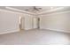 Large main bedroom with carpet, tray ceiling, and neutral walls at 55 Shoreline Dr, Lillington, NC 27546