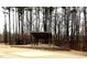 Community picnic shelter with stone retaining wall, great for gatherings and enjoying the outdoors at 55 Shoreline Dr, Lillington, NC 27546