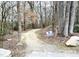 Old Brick Mill Trail winding through the community, perfect for walking, running, and enjoying nature at 55 Shoreline Dr, Lillington, NC 27546