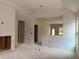 Unfinished open floor plan displaying rough wiring and visible studs, awaiting personalized design at 701 East St, Smithfield, NC 27577