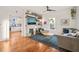 Inviting living room featuring built-in bookshelves, a cozy fireplace, and stylish hardwood floors at 701 Holloway St, Durham, NC 27701