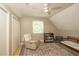 Comfortable bedroom featuring a ceiling fan, a small bed, and charming decor at 711 W Carver St, Durham, NC 27704
