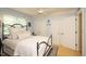 Bright bedroom with a bed, and a view from the window at 711 W Carver St, Durham, NC 27704