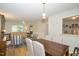 Open-concept living space including a dining area and living room, perfect for entertaining at 711 W Carver St, Durham, NC 27704