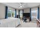 Bright bedroom with natural light, a ceiling fan, and a work space at 7217 Leando Dr, Willow Springs, NC 27592