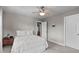 Bedroom showcases neutral paint, carpet, a full bed, and two bright windows at 7217 Leando Dr, Willow Springs, NC 27592