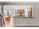 A modern kitchen featuring wood cabinetry, granite countertops, and stainless steel appliances at 7217 Leando Dr, Willow Springs, NC 27592