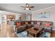 Cozy living room with comfortable seating area, hardwood floors, and easy access to the kitchen at 7217 Leando Dr, Willow Springs, NC 27592
