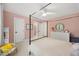 Bedroom features a four poster bed, ceiling fan, and neutral carpet at 7529 Tynewind Dr, Wake Forest, NC 27587