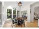 Cozy breakfast nook with large windows offering natural light and backyard views at 7529 Tynewind Dr, Wake Forest, NC 27587