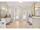 Elegant bathroom with dual vanities, tile floor, and ample space at 7529 Tynewind Dr, Wake Forest, NC 27587