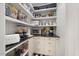Organized pantry with ample shelving and storage space for kitchen essentials at 7529 Tynewind Dr, Wake Forest, NC 27587