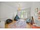 Cozy playroom with large windows, teepee, and natural light at 7529 Tynewind Dr, Wake Forest, NC 27587