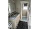 Bathroom with a marble countertop vanity, decorative tiled floor, and a toilet room at 8 Open View Ln, Timberlake, NC 27583
