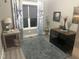 Living room with modern furniture, decor, and natural light creates a cozy space at 8 Open View Ln, Timberlake, NC 27583