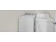 Laundry area featuring a white washing machine and dryer with basic functionality at 86 Woodall Farm Ln, Princeton, NC 27569