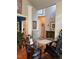 Stylish home office area with a glass desk and hardwood floors, perfect for remote work at 917 Widewaters Pkwy, Knightdale, NC 27545