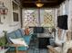 Cozy sunroom with comfortable seating, a patterned rug, and decorative accents at 917 Widewaters Pkwy, Knightdale, NC 27545