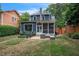 Backyard featuring outdoor seating and lush greenery, perfect for entertaining or relaxing at 1213 Pierce St, Raleigh, NC 27605