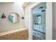Tastefully designed bathroom with furniture and tiled flooring, and a glimpse of another bathroom at 1213 Pierce St, Raleigh, NC 27605