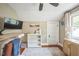 Bedroom featuring neutral walls, a work space, and hardwood floors with an area rug at 1213 Pierce St, Raleigh, NC 27605
