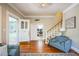 Open foyer featuring hardwood floors and staircase at 1213 Pierce St, Raleigh, NC 27605