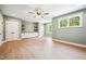 Open bonus room with wood floors, cabinets, a ceiling fan and natural light at 150 Purslane Dr, Franklinton, NC 27525